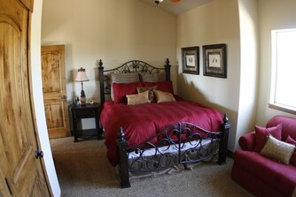 Bedroom with wrought iron bed frame