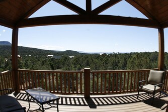 Covered deck with mountain views